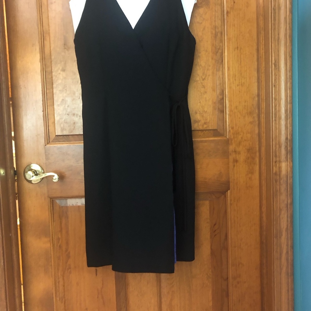 Black faux wrap dress fully lined in satiny periwinkle, sleeveless, knee length